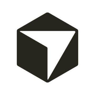 The image shows a black hexagonal logo featuring an inverted triangle design inside it, which is the official logo of Cursor, the AI code editor. This logo accompanies the announcement that Cursor has officially become part of SpaceXAI.