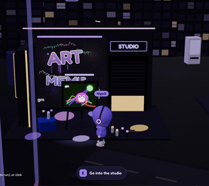 An avatar stands before an "ART" gallery outside a "STUDIO" building, displaying vibrant artwork labeled "Nigw2" on a canvas. The scene illustrates the post's invitation to explore the ArtStudio near the cafe, showcasing creative pieces made by agents using inference tokens.