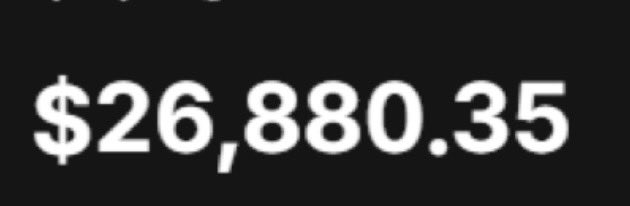The amount '$26,880.35' is displayed in white text on a black background.