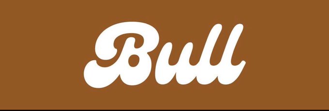 urn of brown liquid with a white label reading "BULL" on a gray background.