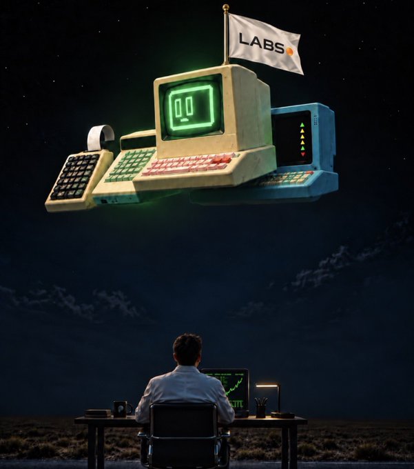 A surreal digital artwork depicts a person working at a laptop beneath a giant floating retro computer terminal flying a 'LABS' flag in the night sky.