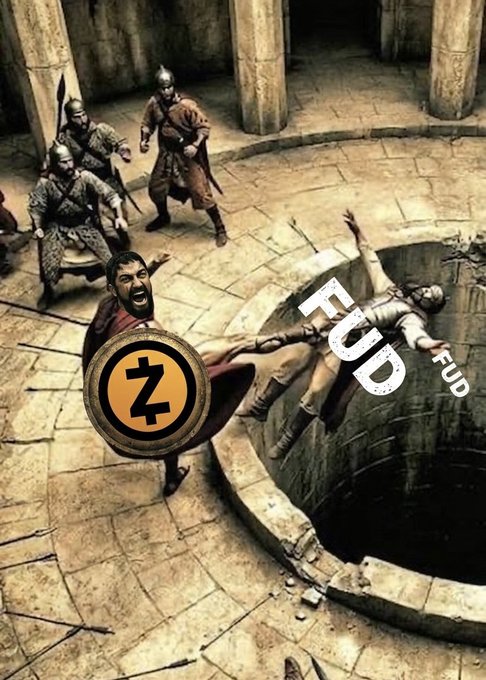 The image features a group of people dressed in medieval clothing, with one person holding a shield that has the letter "Z" written on it. The caption reads "FUD", which seems to be a reference to Bitcoin or cryptocurrency.
