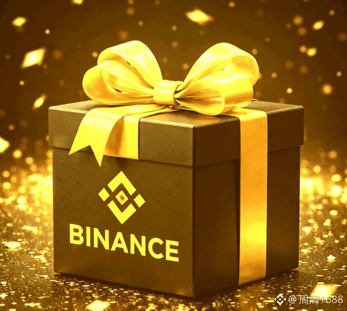 A dark gift box with a large golden ribbon and bow sits against a sparkling gold background. The box features a logo and the word 'BINANCE' in gold text, with a watermark '周周1688' in the bottom right corner.