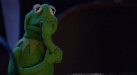 The image features a green frog character from the movie "The Muppets", sitting next to a chair with its mouth open, as if pondering or contemplating something. The background of the image is dark, which adds to the overall moodiness of the scene and emphasizes the frog's introspective state. The post that accompanies this image seems to be about the character from the movie, possibly discussing their feelings or thoughts in relation to the character.