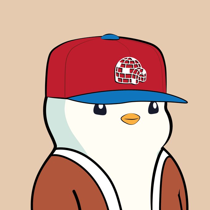The image features a cartoon penguin wearing a red baseball cap with a white logo of an igloo on it. The penguin appears to be standing against a light brown background, giving the impression that they are in a snowy environment. The caption provided seems unrelated to the image and is likely meant for another post or discussion.