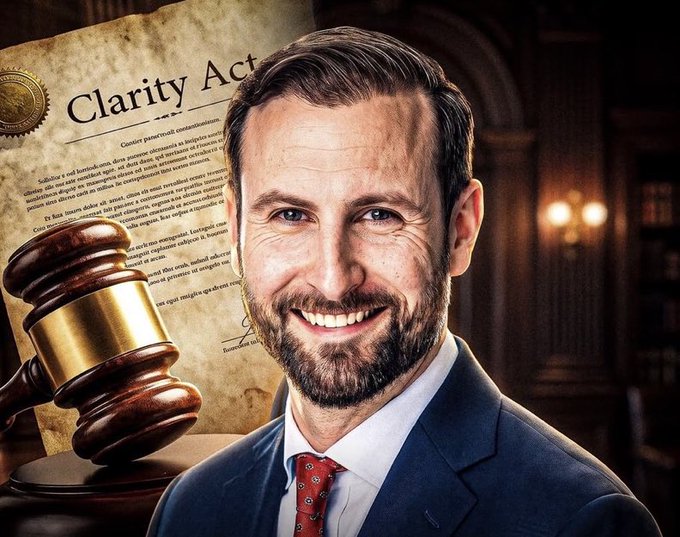 A digitally stylized portrait of a smiling bearded man in a blue suit and red tie, alongside a judge's gavel and a document titled 'Clarity Act' in the background.