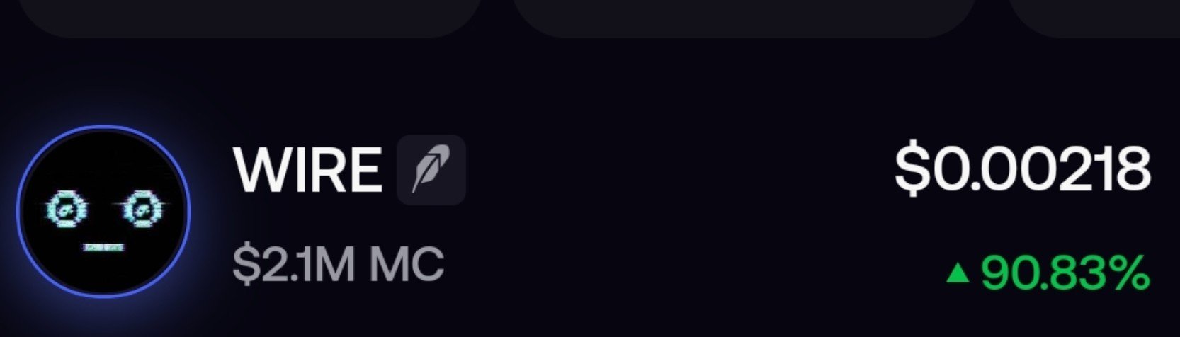A cryptocurrency price display showing WIRE token at $0.00218 with a 90.83% gain and $2.1M market cap, featuring a glowing digital face icon.
