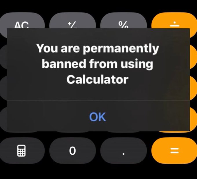 iphone calculator app displays a message, "You are permanently banned from using Calculator", with a black background and white text.