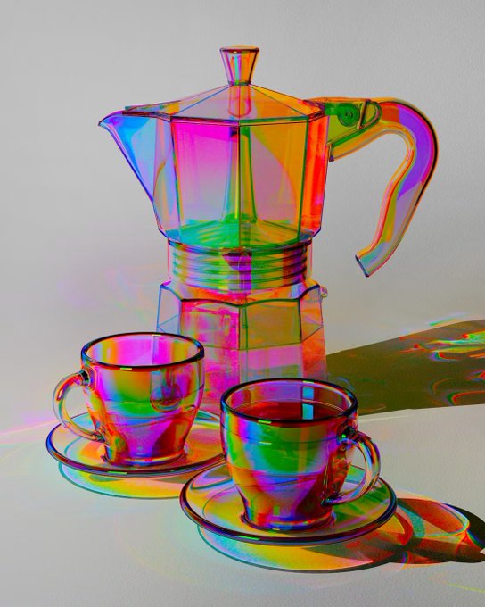 A glass coffee maker and two matching cups and saucers refract light into vibrant rainbow colors against a white background.
