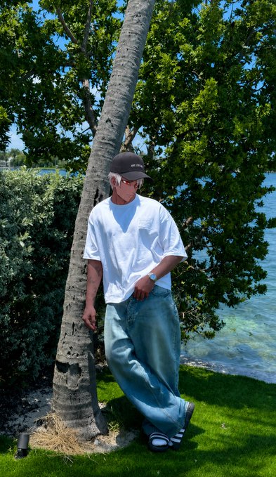 A man wearing a white shirt and blue jeans stands leaning against a tree near water. The photo has been edited with a filter that gives it a vintage appearance. The caption of the image reads, "Good morning CT.... TGIF Happy Fridayyyyy to yalllll Another day to show presence on @NomismaNetwork Few days left to talk about @River4fun, might finally cross @RIVER points today Also my rank on @TheARCTERMINAL keeps improving, Abt to break into the top 500".