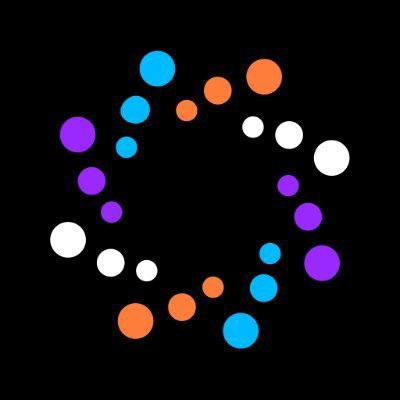 A circular arrangement of colorful dots in purple, blue, orange, and white forms a ring against a black background, symbolizing the interconnected yet distinct data signals traders must evaluate. The abstract design visually represents the post's message about how traders face a decision problem rather than a data problem, as they must determine which signals—like whale transfers or token attention spikes—truly matter among the noise.