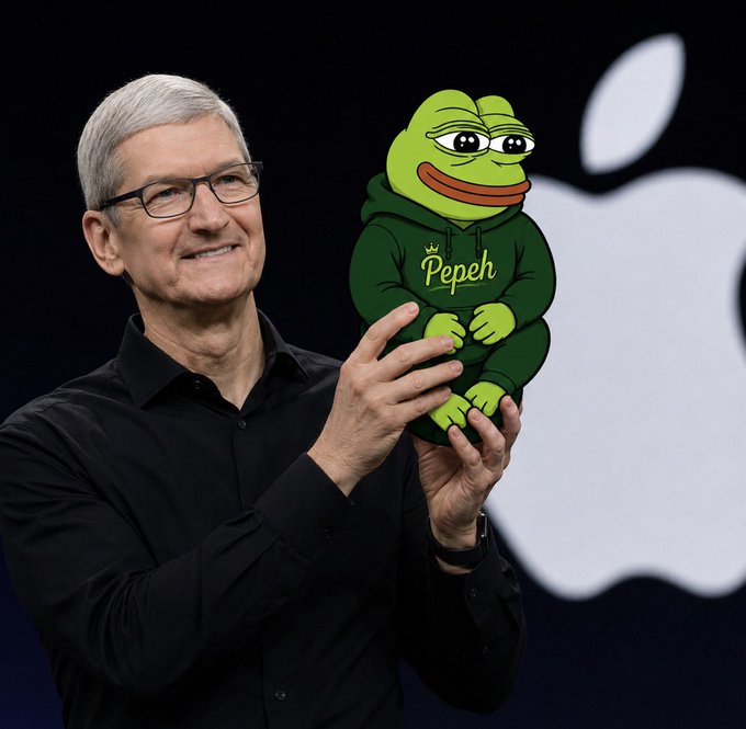 Tim Cook, Apple's CEO, is shown holding a Pepe the Frog plush toy wearing a green 'Pepeh' hoodie, with the Apple logo visible in the background.
