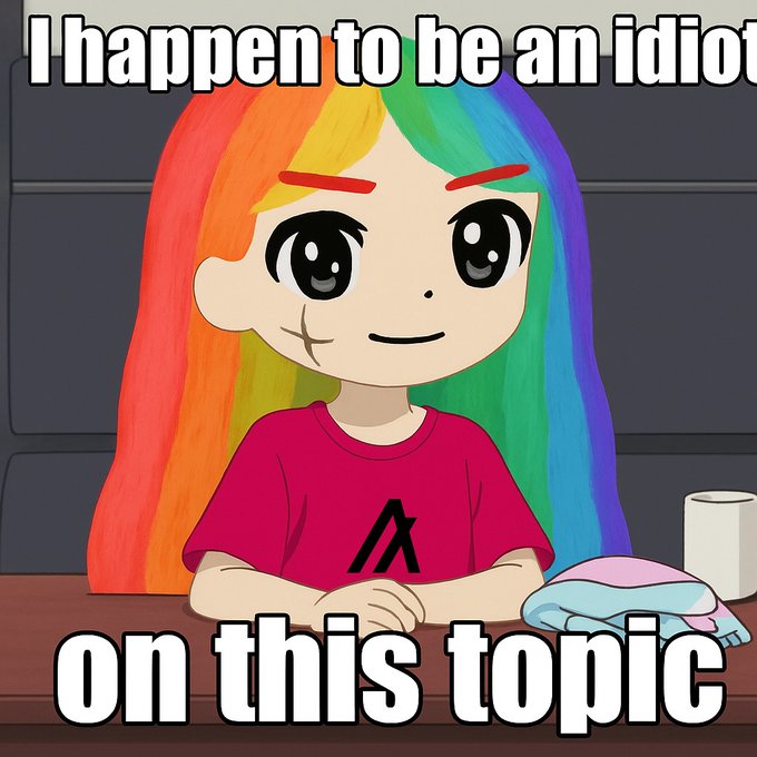 An animated character with rainbow hair and a scar sits at a table beside a pink, blue, and white cap, with bold white text overlaid reading "I happen to be an idiot" at the top and "on this topic" at the bottom. The meme's self-deprecating humor aligns with the daily shitpost format, delivering a humorous disclaimer of ignorance on a particular subject.