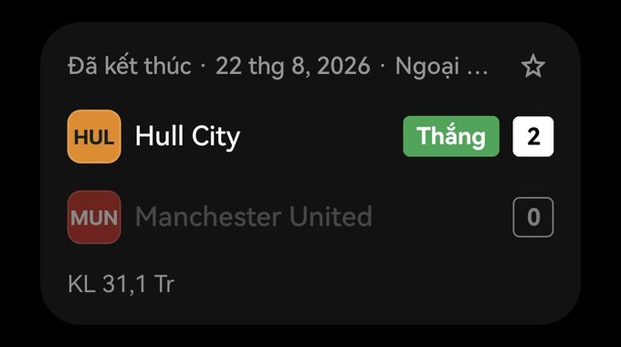 A sports betting result card from OKX showing a finished match on August 22, 2026, where Hull City won 2-0 against Manchester United, with 31.1K followers. The image illustrates the poster's excitement about Vietnam's win overshadowing their forgotten bet, only to discover Manchester United had lost to Hull City—a disappointing outcome for the "out of luck" MU supporter that ironically earned them points on OKX.