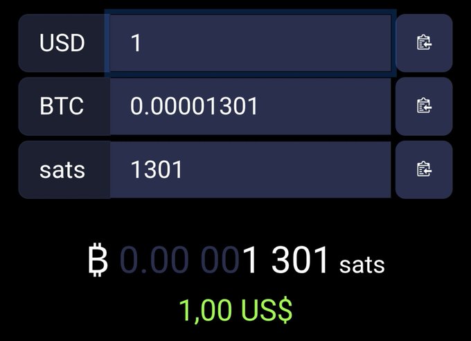 A dark-themed currency converter shows '1 USD' equals '0.00001301 BTC' or '1301 sats', with '1,00 US$' and '0.00 001 301 sats' displayed below in green and white text.
