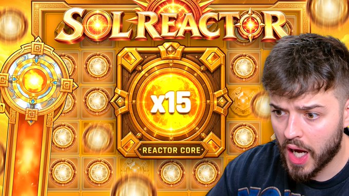 A thumbnail-style image showing a man reacting with surprise next to a 'SOLREACTOR' game screen displaying a 'Reactor Core' with a glowing 'x15' multiplier.