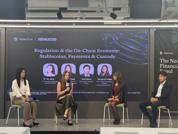 A panel discussion at KBW2026 (Injective) titled 'Regulation & the On-Chain Economy: Stablecoins, Payments & Custody' featuring speakers DJ Jang, Fraser, Abel Seow, and Sunayna Tuteja on stage.