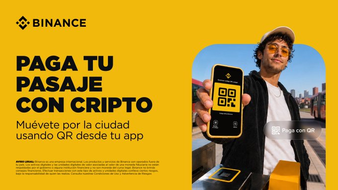A Binance promotional banner advertises paying bus fares with cryptocurrency via QR code, featuring a young man holding a smartphone displaying the Binance app's QR scanner, with the headline "PAGA TU PASAJE CON CRIPTO" (Pay your ticket with crypto) and tagline "Muévete por la ciudad usando QR desde tu app" (Move around the city using QR from your app), directly illustrating the post's message about paying bus fares with crypto.