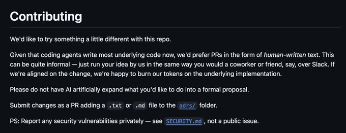GitHub repository 'Contributing' guidelines stating they prefer 'human-written text' for PRs over AI-written code, asking contributors not to use AI to expand ideas into formal proposals.