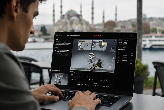 A man works on a laptop displaying the EZ Robot Platform software, with the Blue Mosque visible in the background across a body of water in Istanbul.