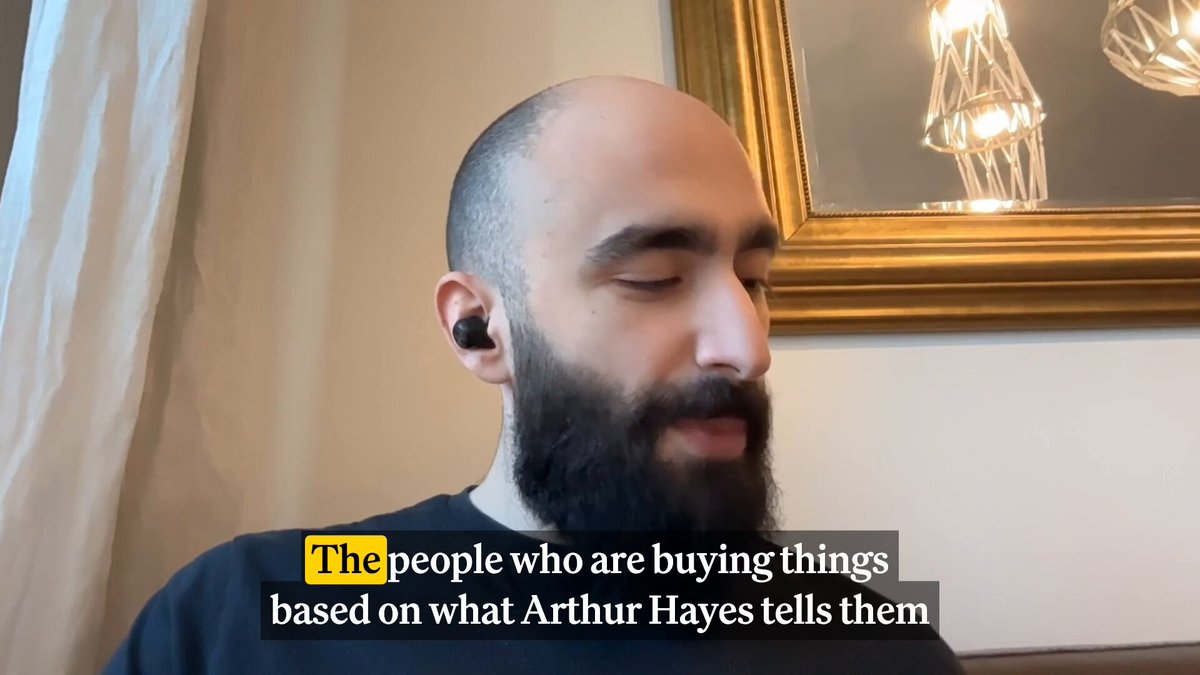 The image features a man with a beard wearing earbuds, sitting down and looking at something off-camera. The caption of the image reads "MERT: You can be as angry as you are, but like fundamentally, that just means he has edge over you." This statement is related to the post about Arthur Hayes selling his $hype and $near positions on Twitter.