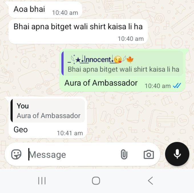 Screenshot of a WhatsApp chat in Hindi where a contact named 'Aura of Ambassador' shares a shirt design ('Aura of Ambassador') in response to a question about a budget shirt.
