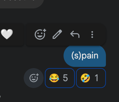 A dark-themed messaging app interface shows a user sending the word "(s)pain" with reaction emojis showing 5 laughing and 1 loudly crying face.