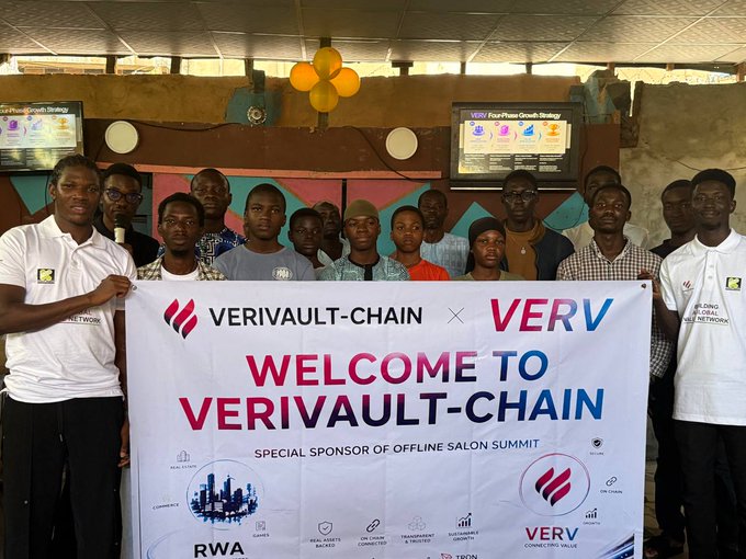 A group of attendees pose together holding a "Welcome to Verivault-Chain x VERV" banner at the VERV Offline Salon Summit in Lagos, Nigeria on September 5, 2026. The event, branded as a special sponsor of the Offline Salon Summit, gathered local Web3 users and community partners to learn about the VERV ecosystem.