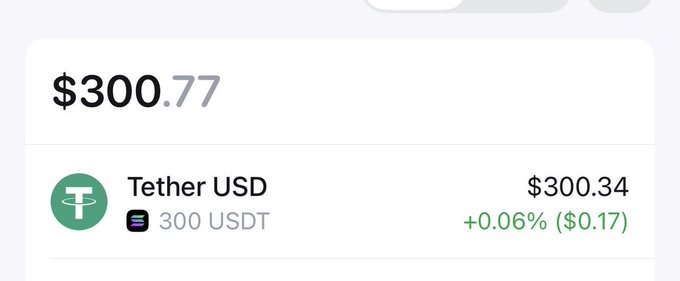 A cryptocurrency app interface displaying a total balance of $300.77, with 300 USDT (Tether USD) valued at $300.34, showing a +0.06% gain of $0.17.