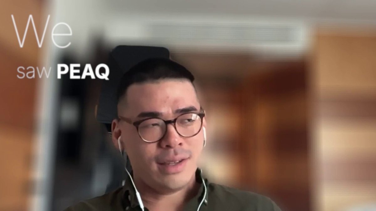 The image features a man wearing glasses and earbuds, sitting down and looking at something off-camera. The caption above him reads "We saw peaq", which could be interpreted as an AI or machine learning project that he is working on. This project has implications for humanity across the board, with crypto playing an important role in making this category investable for all.