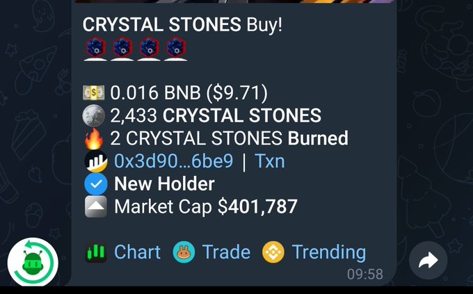 A token information panel showing a 'CRYSTAL STONES Buy!' transaction for 0.016 BNB ($9.71), with 2,433 crystal stones and a market cap of $401,787.