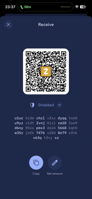 A mobile app screen displays a 'Receive' function with a QR code for cryptocurrency, showing a shielded transaction code below it.