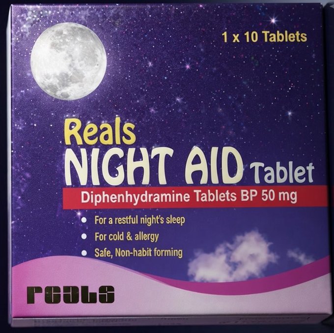 A box of "Reals Night Aid Tablet" containing 1x10 tablets of Diphenhydramine BP 50mg, marketed for restful sleep and relief from cold and allergy symptoms. The product fits the post's theme, as the user appears to be sleep-deprived from overworking and saying goodnight.