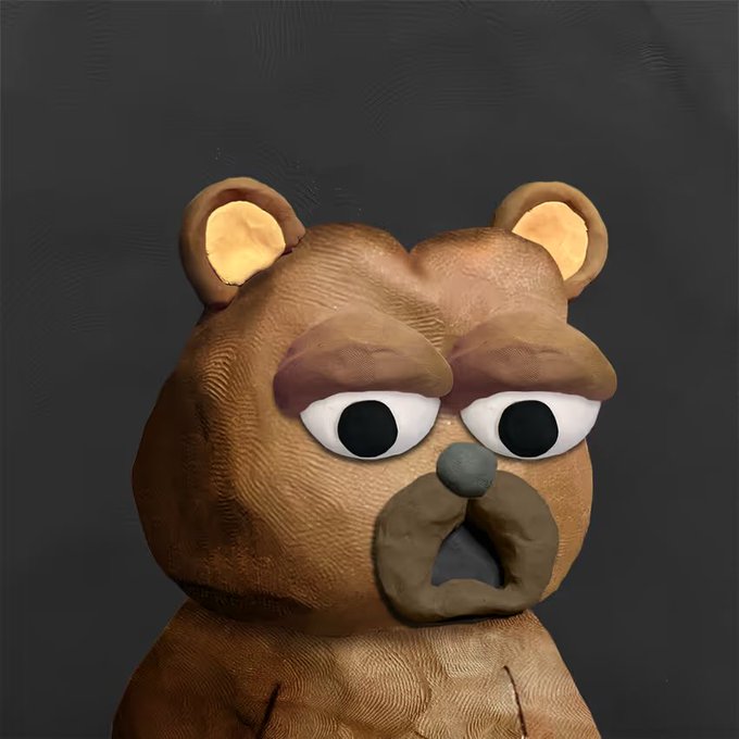 A 3D-rendered brown clay bear character with a serious, slightly angry expression staring directly forward against a dark gray background.