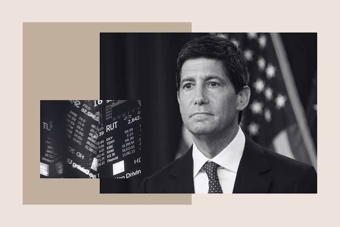 A black and white photo of a man in a suit is overlaid with an inset image showing stock ticker symbols.