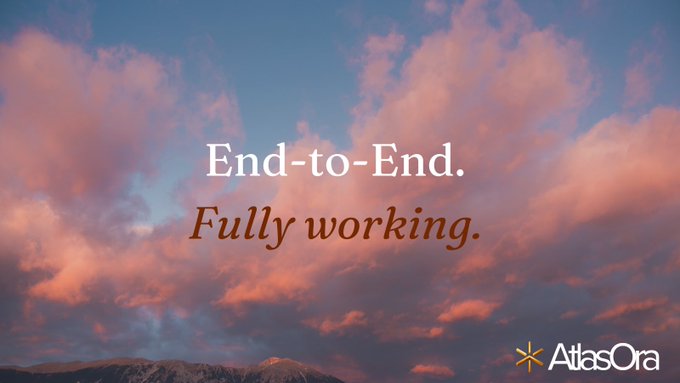 The image shows a sky with clouds against a gray background. There are no texts or other objects present in the image, but there is an advertisement for AtlasOra that reads "End-to-end. Fully working." The text appears to be in white and orange colors, which contrasts well with the gray background of the sky.