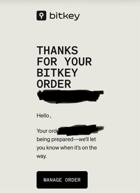 A confirmation email screenshot from 'bitkey' reading 'THANKS FOR YOUR BITKEY ORDER' with portions redacted, stating the order is being prepared.
