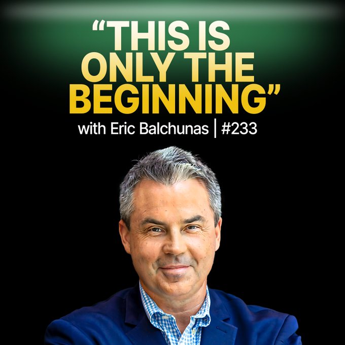 The image features a man wearing a blue shirt with a smile on his face. The background is black, making him stand out against it. Below the main subject, there are some text elements that read "This is only the beginning" and "with Eric Balchunas #233". These texts seem to be related to the content of the image or the post itself.