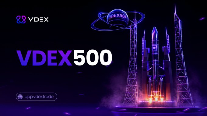 A promotional graphic for 'VDEX 500' featuring the VDEX logo, a stylized 3D rocket launching between towers, and the URL 'app.vdextrade'.