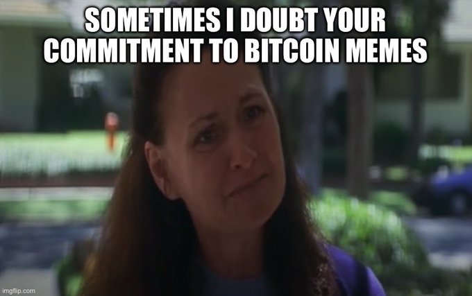 A woman with a concerned, skeptical expression appears outdoors with the caption "SOMETIMES I DOUBT YOUR COMMITMENT TO BITCOIN MEMES" overlaid in white text. The image humorously responds to the post's challenge to share a Bitcoin meme, playfully expressing doubt about the poster's enthusiasm for cryptocurrency humor.
