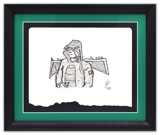 A framed sketch portrait of a person wearing a hooded jacket, drawn using small text characters, with a signature and date '23/XII 00' in the corner.
