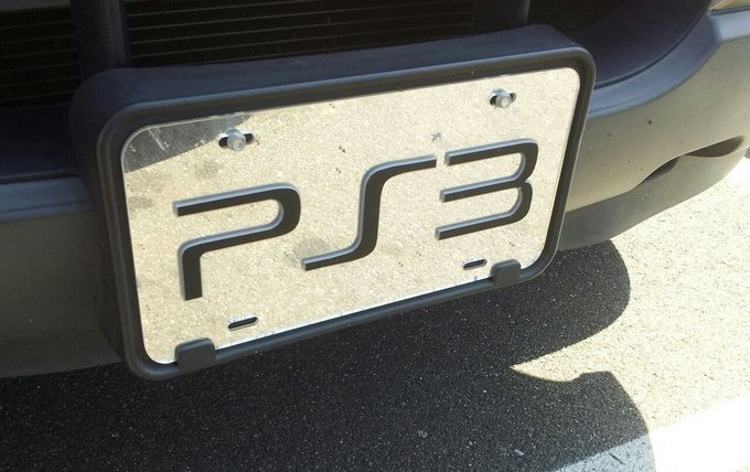 A stylized Porsche license plate mounted on the front of a vehicle.