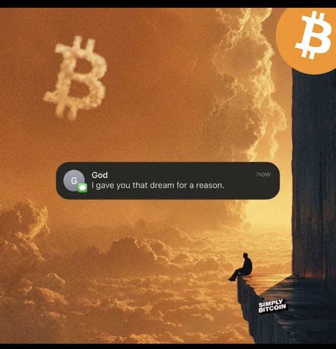 A meme showing a person sitting on a ledge in clouds with a Bitcoin symbol in the sky, featuring an iMessage notification from 'God' saying 'I gave you that dream for a reason,' branded with 'Simply Bitcoin.'