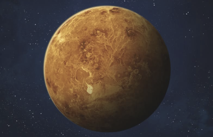 A glowing orange-brown planet floats against a starry dark blue cosmic backdrop, with Venus-like surface features and craters visible across its spherical form. The image visually echoes the post's whispered word "Venus," capturing the warm, otherworldly appearance associated with our neighboring planet.