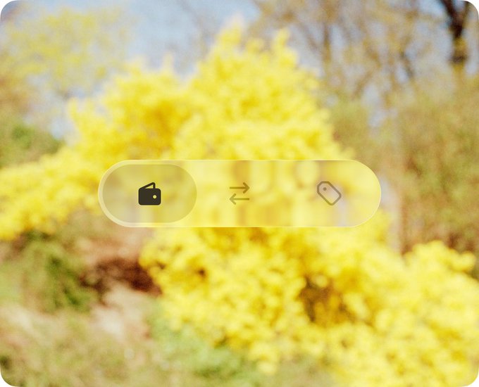 A close-up view of a yellow foliage background with a translucent, pill-shaped widget overlay in the center, containing a wallet icon, a swap/transfer symbol with arrows, and a price tag icon.