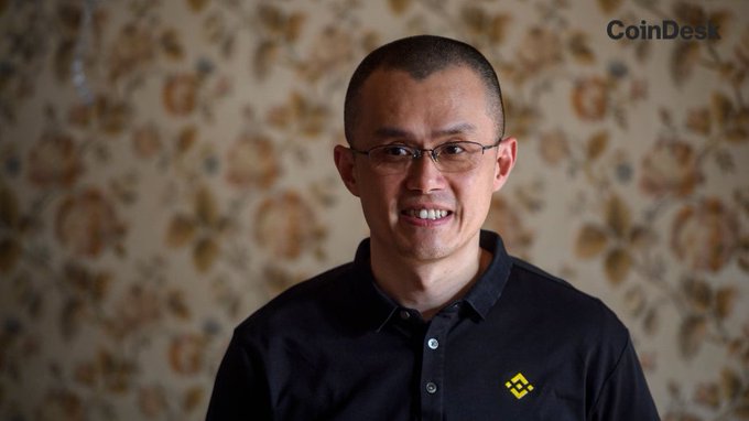 Binance founder Changpeng Zhao (CZ) smiles in a portrait shot featuring a "CoinDesk" watermark in the upper right corner, accompanying a quote about Bitcoin's scarcity relative to U.S. millionaires.