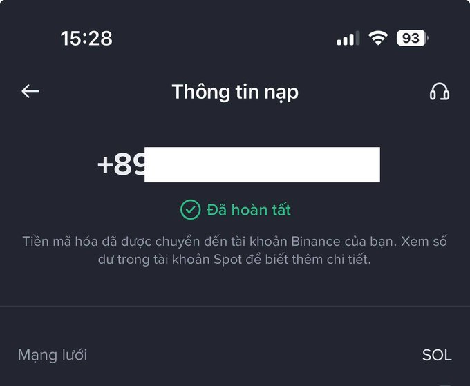 A mobile screenshot showing a Binance deposit confirmation in Vietnamese with 'Đã hoàn tất' (Completed) status, displaying a partially redacted phone number starting with +89 on the SOL network.
