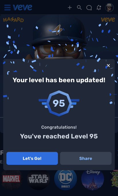A VeVe app screenshot showing a congratulations pop-up message 'Your level has been updated! You've reached Level 95' with a HAZARD character wearing a helmet and glasses in the background.