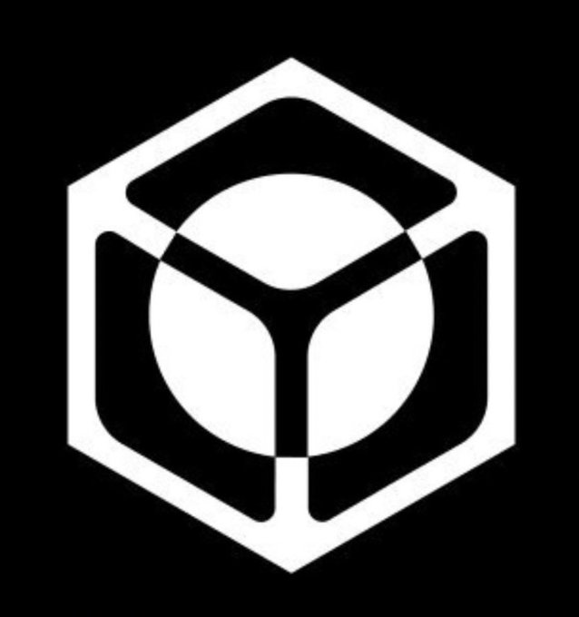 A black and white logo featuring a hexagon enclosing a stylized geometric design with a circle and three angular shapes.
