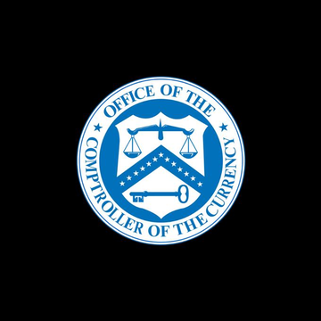 The image displays the official seal of the **Office of the Comptroller of the Currency (OCC)**, featuring scales of justice and a key emblem in blue and white. The seal visually represents the federal banking regulator referenced in the post, which announced that its final GENIUS Act rule will be released by November.